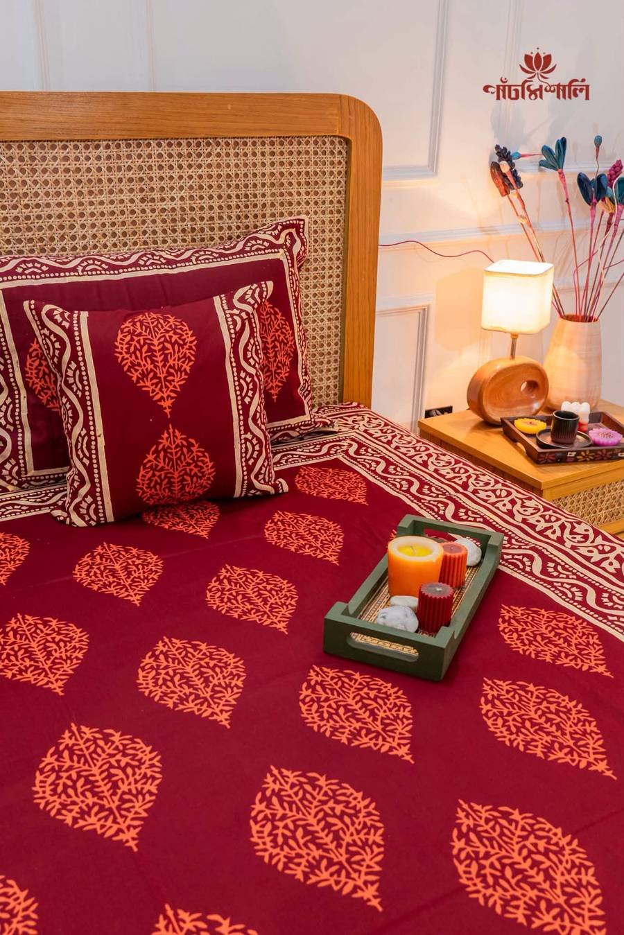 Maroon botanical bedsheet, full bed view
